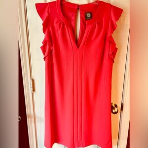 Vince Camuto melon knee length dress with ruffle detail